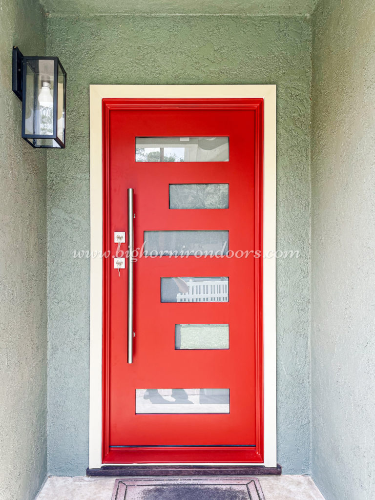 A close-up of a beautiful single entry steel door installed at entryways.